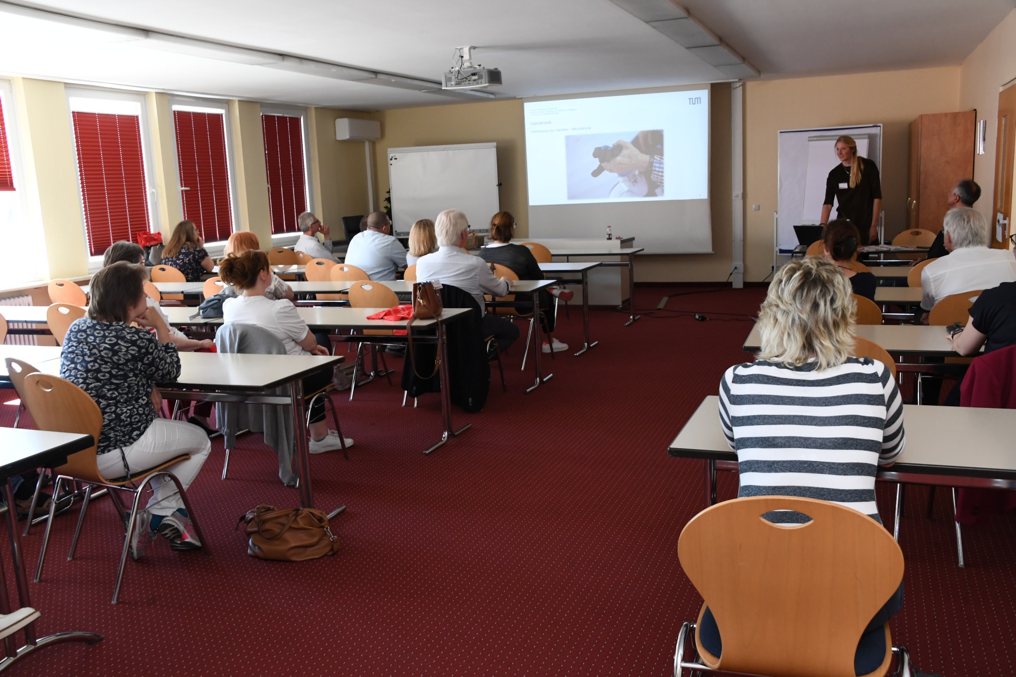 Personen in Workshopraum